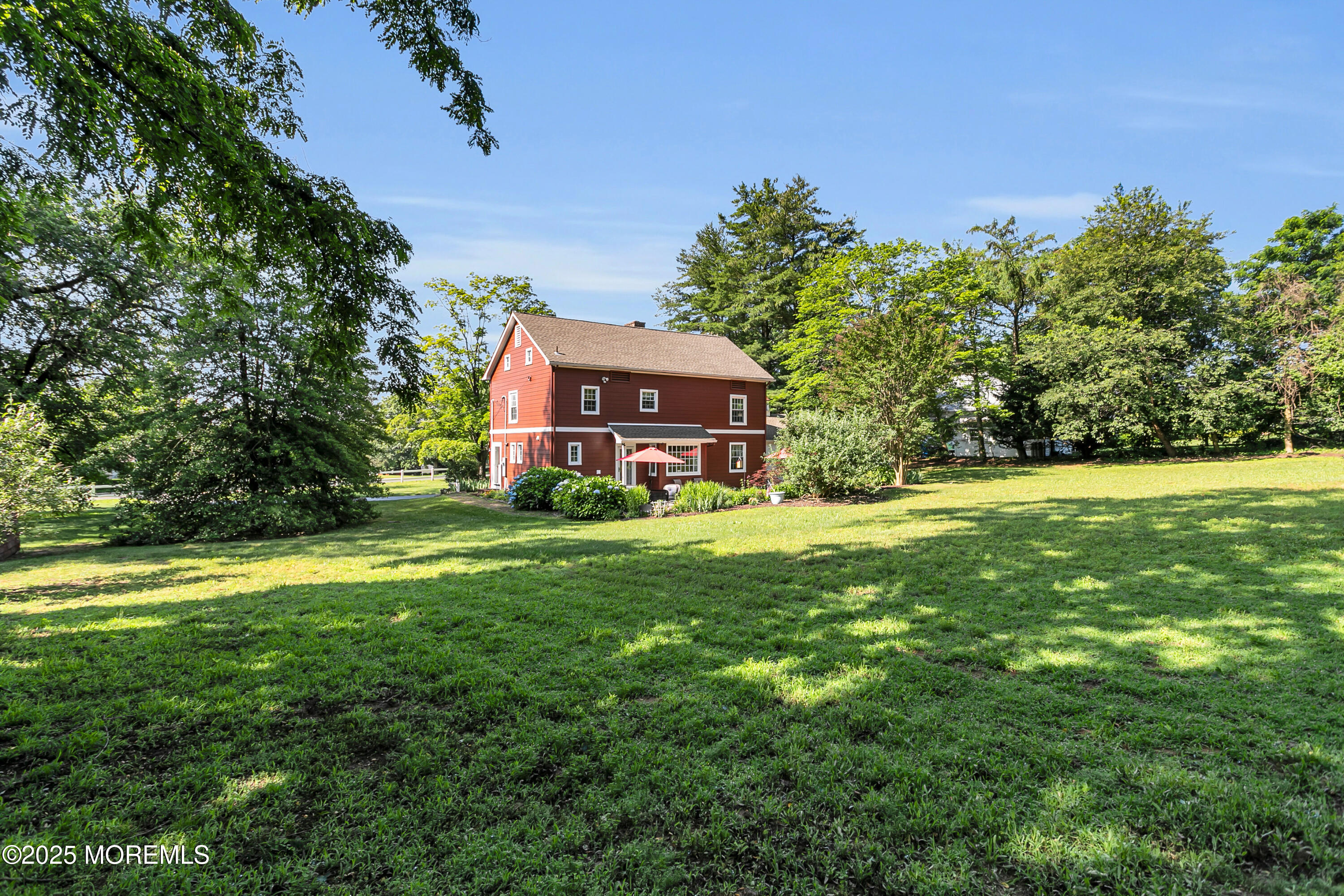 263 Cooper Road Red Bank, NJ 07701 - Photo 35 of 42 a view of a house with a big yard