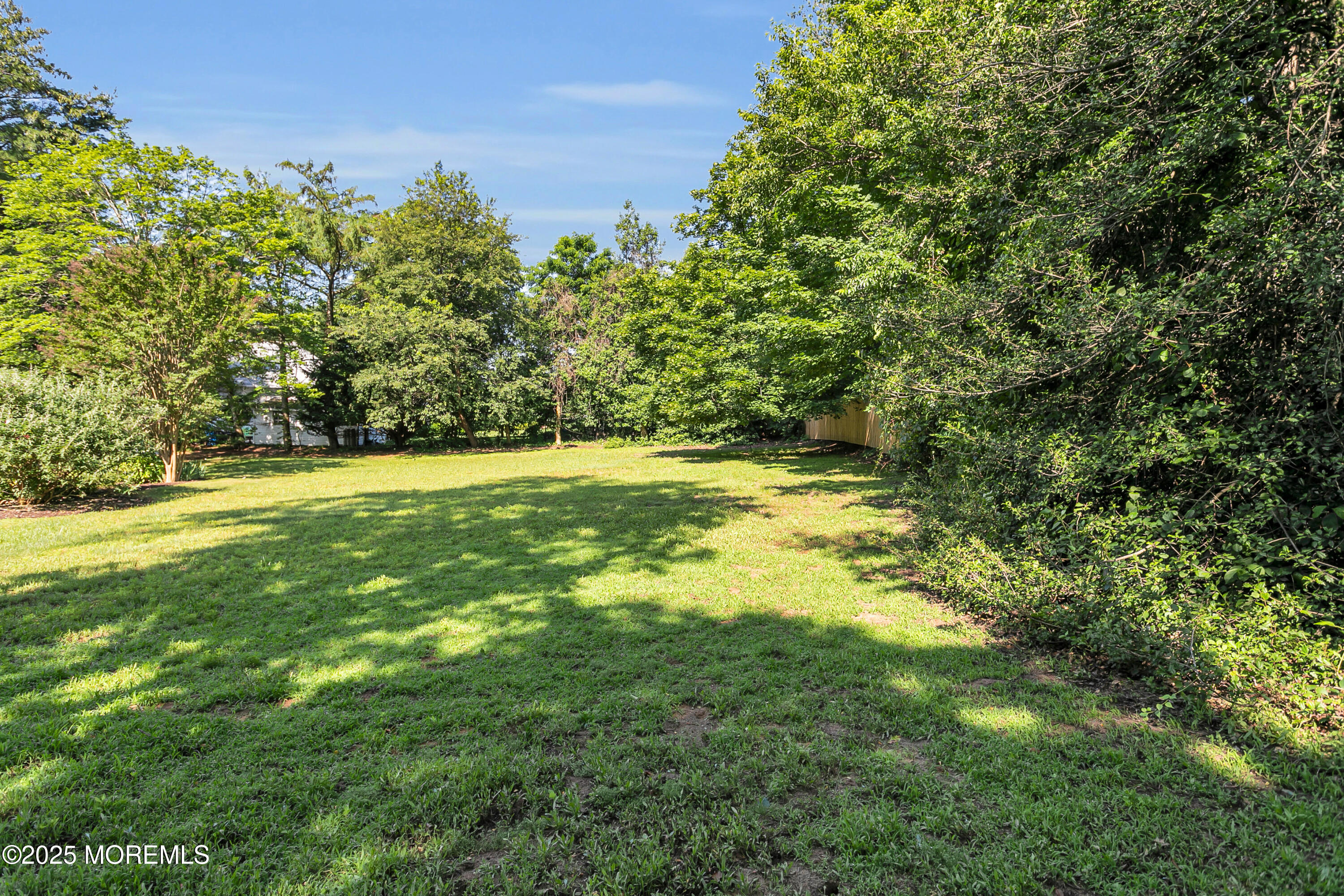 263 Cooper Road Red Bank, NJ 07701 - Photo 38 of 42 a view of an outdoor space and a yard