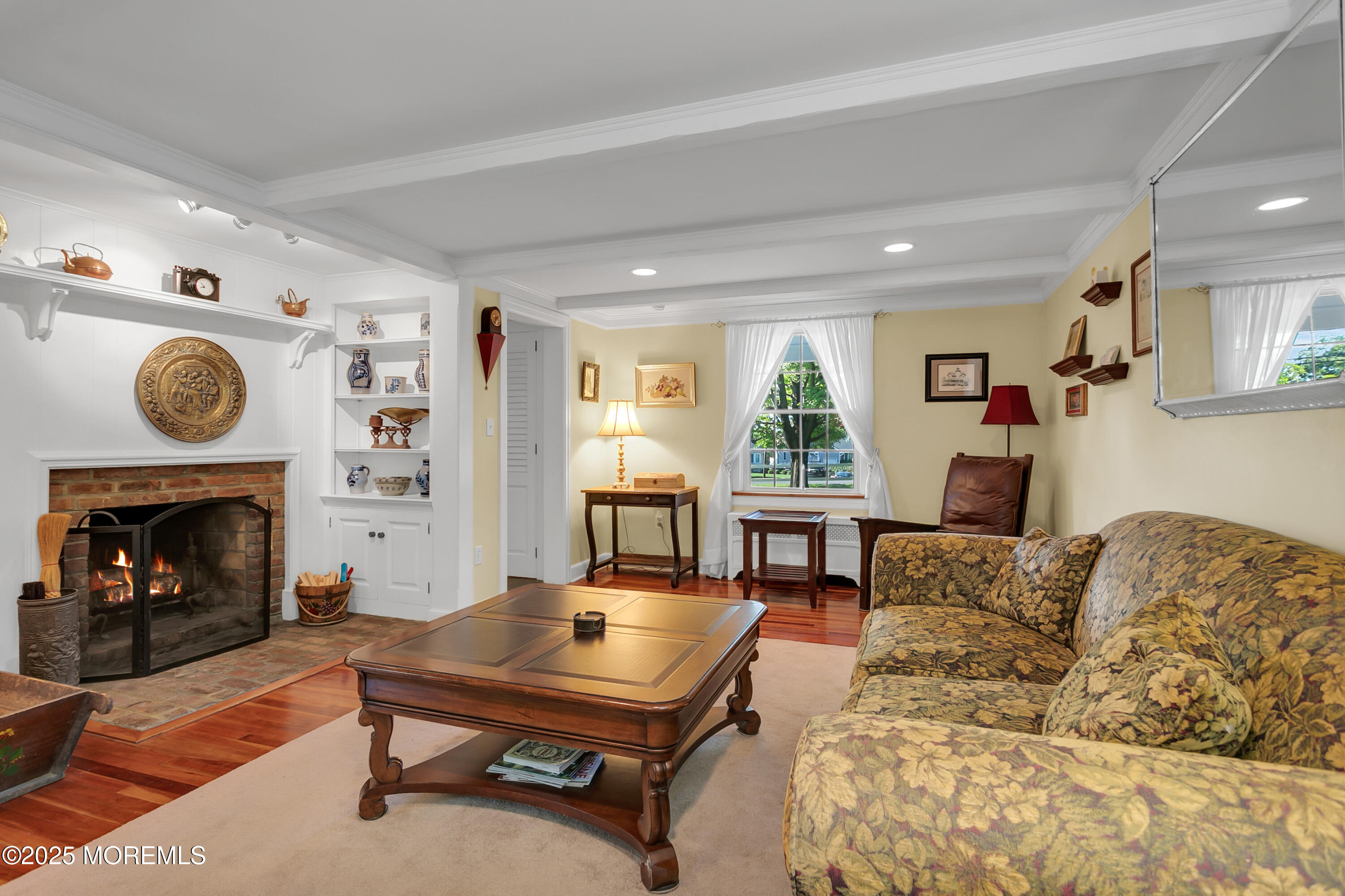 263 Cooper Road Red Bank, NJ 07701 - Photo 8 of 42 a living room with furniture a fireplace and window