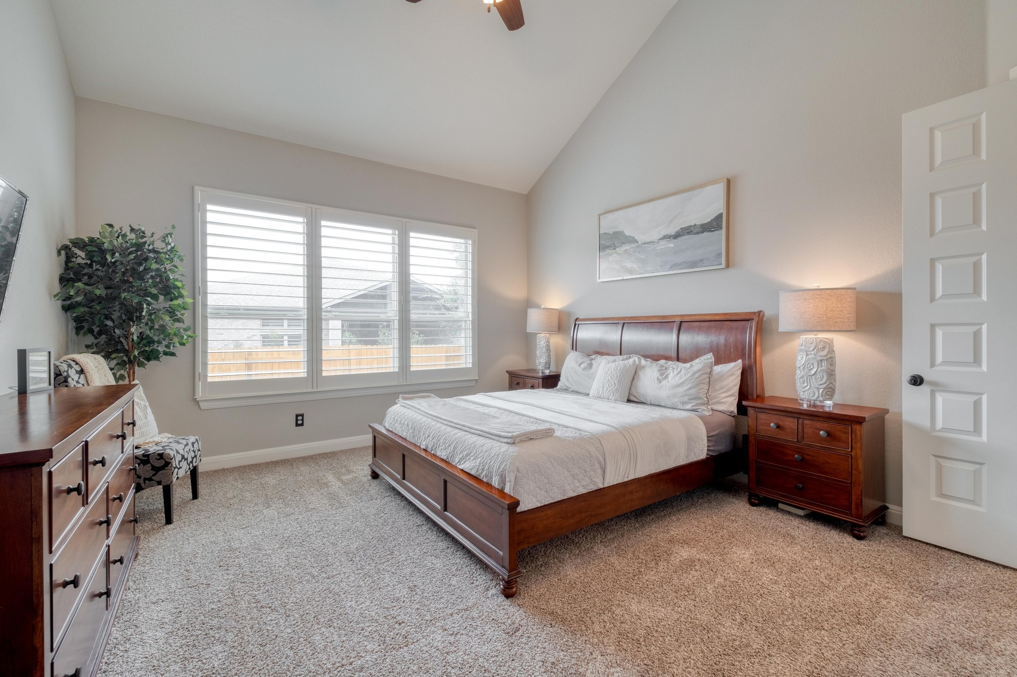 3836 Kyler Glen Road Round Rock, TX 78681 - Photo 19 of 38 a spacious bedroom with a bed and a couch