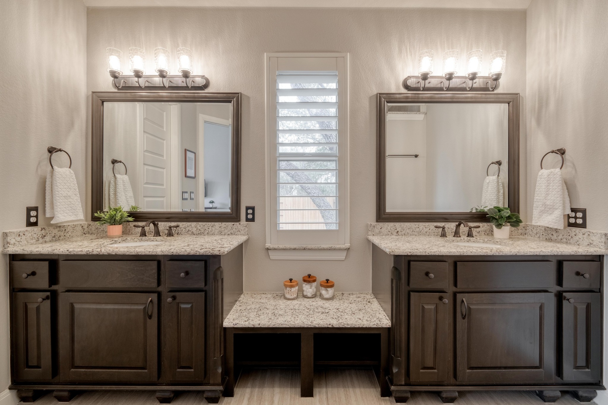 3836 Kyler Glen Road Round Rock, TX 78681 - Photo 22 of 38 a bathroom with a sink double vanity and a mirror