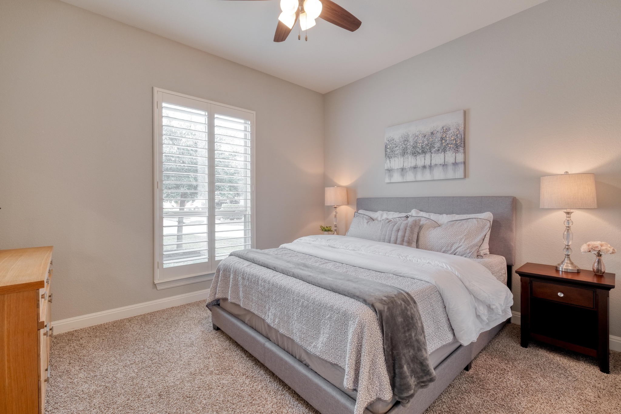 3836 Kyler Glen Road Round Rock, TX 78681 - Photo 27 of 38 a bed room with a bed and a chandelier