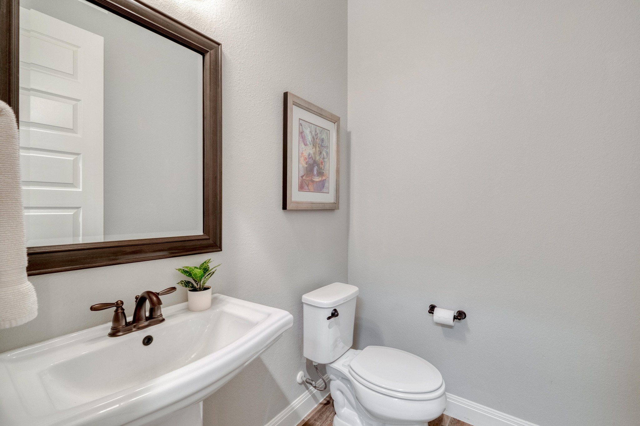 3836 Kyler Glen Road Round Rock, TX 78681 - Photo 34 of 38 a bathroom with a sink a mirror and a toilet