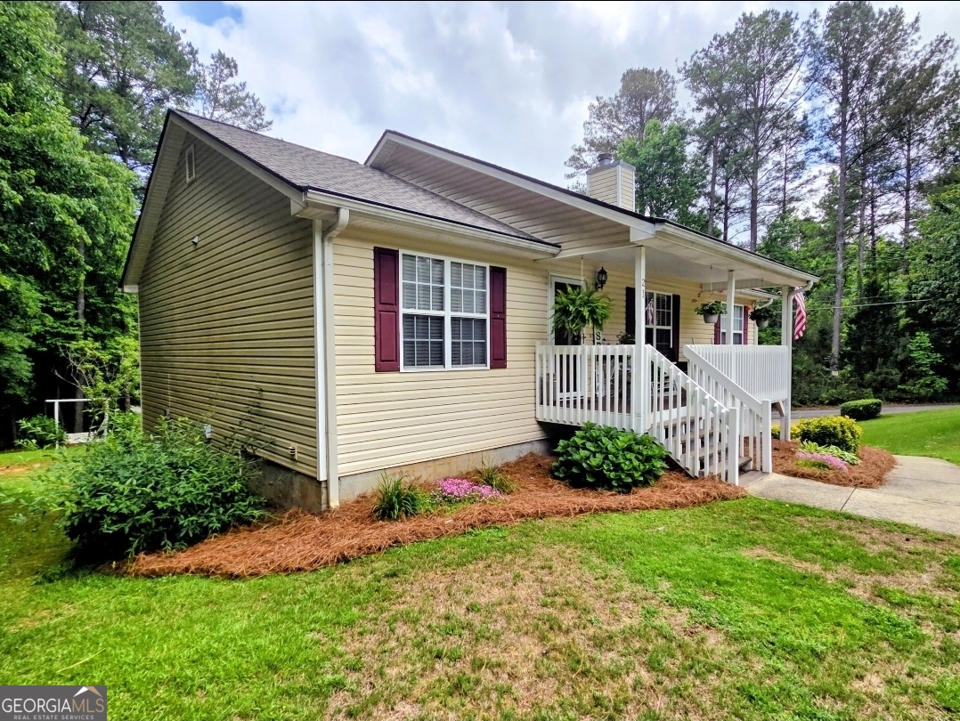 21 Baskin Heights Path Temple, GA 30179 - Photo 2 of 44 a front view of a house with garden