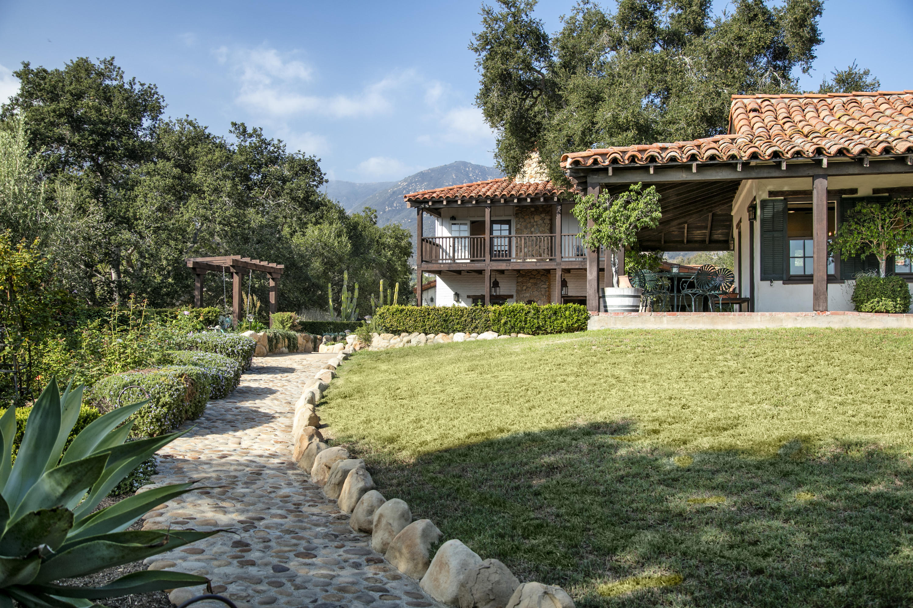 308 Ennisbrook Drive Montecito, CA 93108 - Photo 11 of 31 a view of a house with garden and sitting area