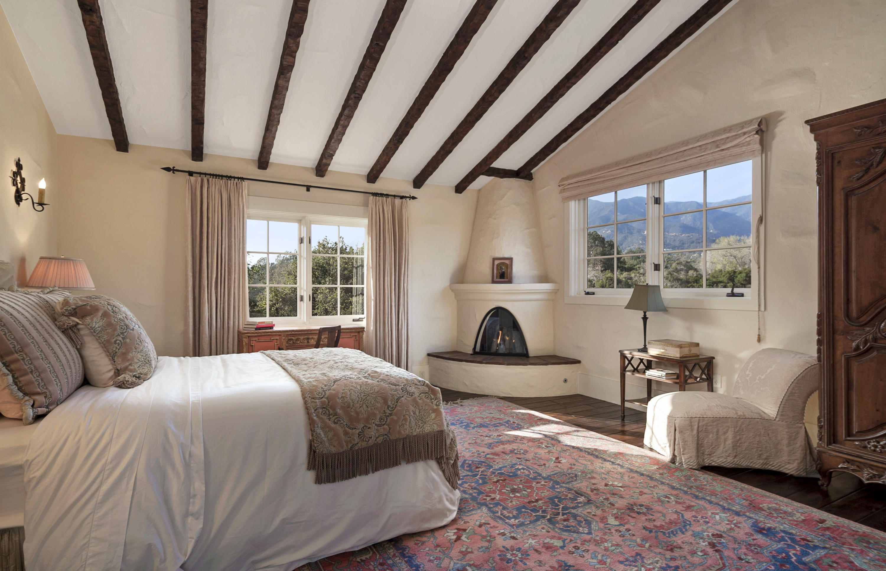 308 Ennisbrook Drive Montecito, CA 93108 - Photo 19 of 31 a bedroom with a bed couch and a window