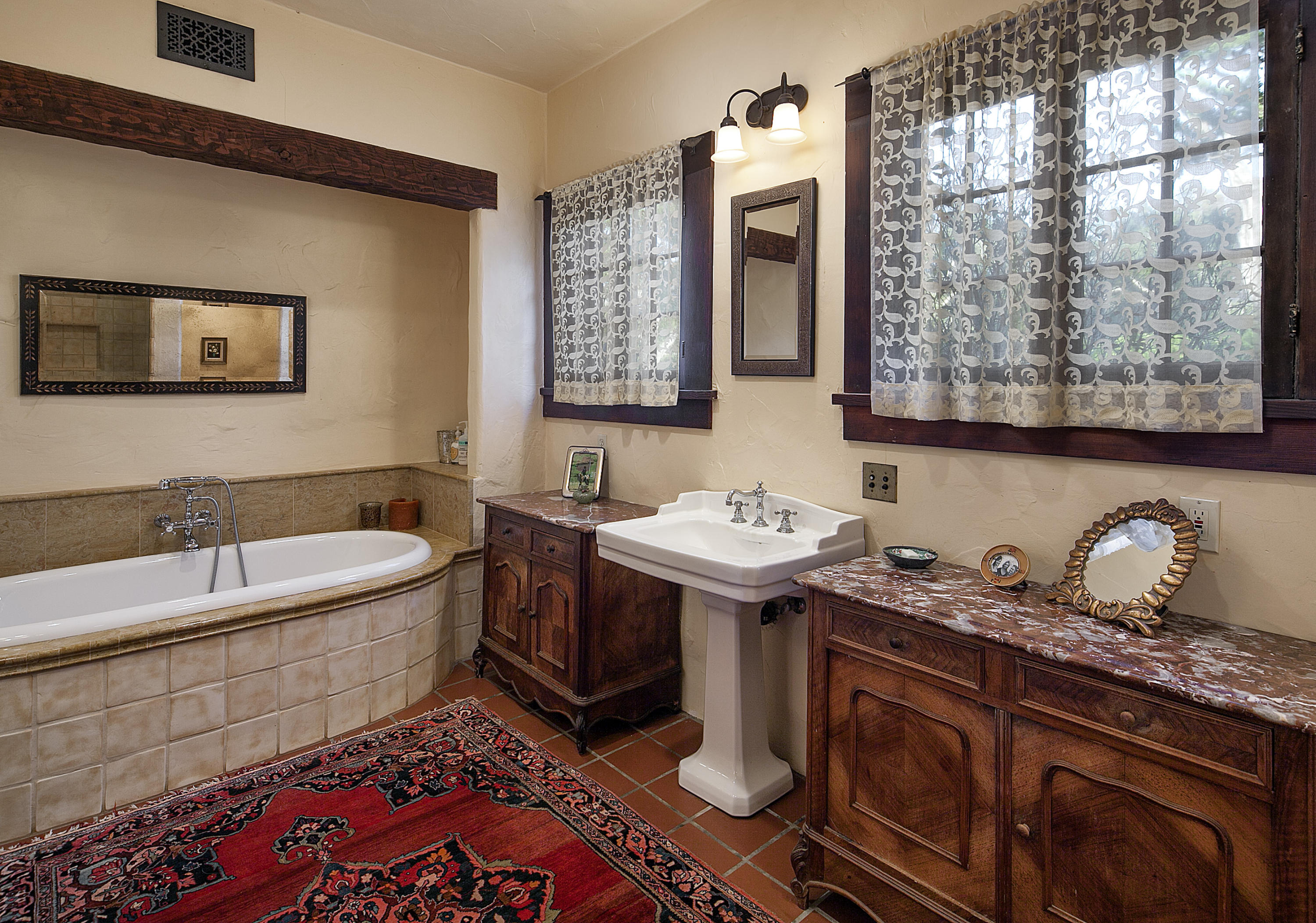 308 Ennisbrook Drive Montecito, CA 93108 - Photo 22 of 31 a bathroom with a sink and a bathtub