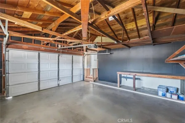 a view of a room with wooden walls