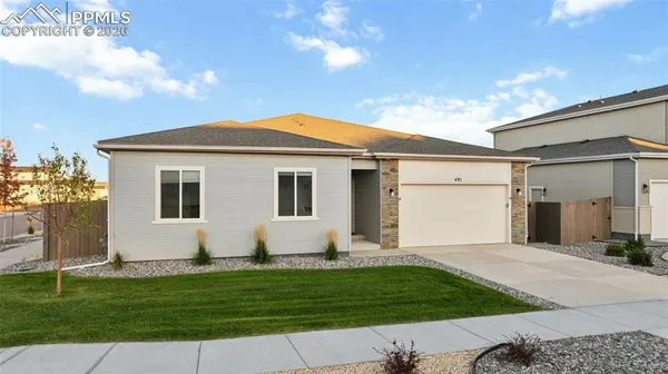 a front view of house with yard
