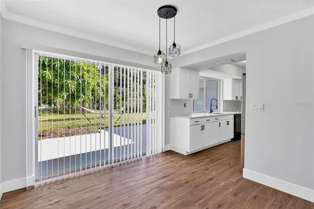 a large white room with a large window