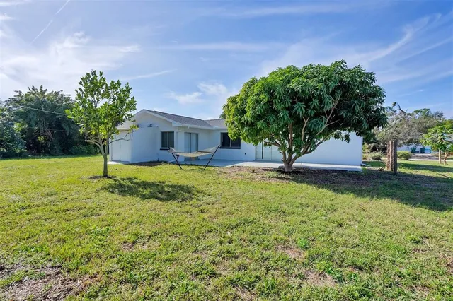 a house view with a garden space