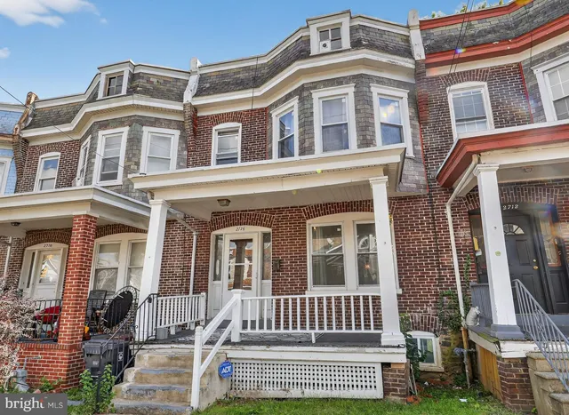 a front view of a brick building