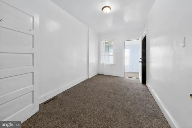 an empty room with closet