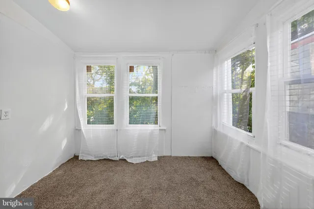 an empty room with an entryway