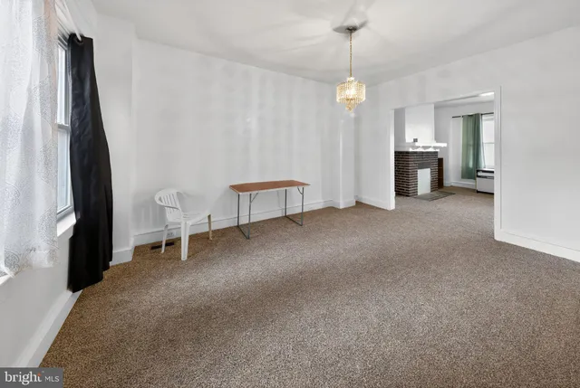 a view of a room and window