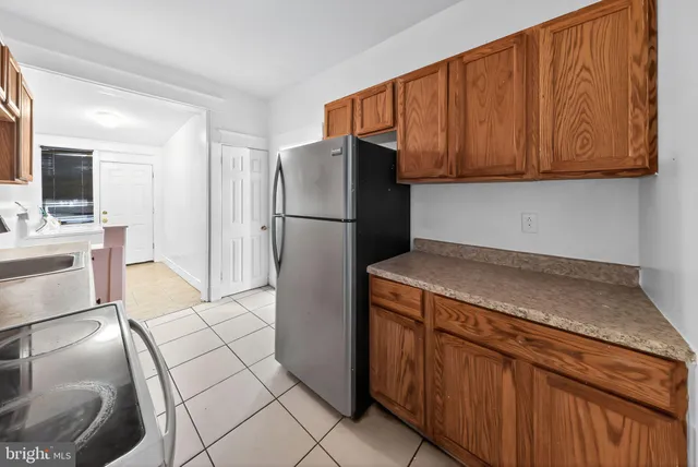 a view of a bathroom with a sink and mirror