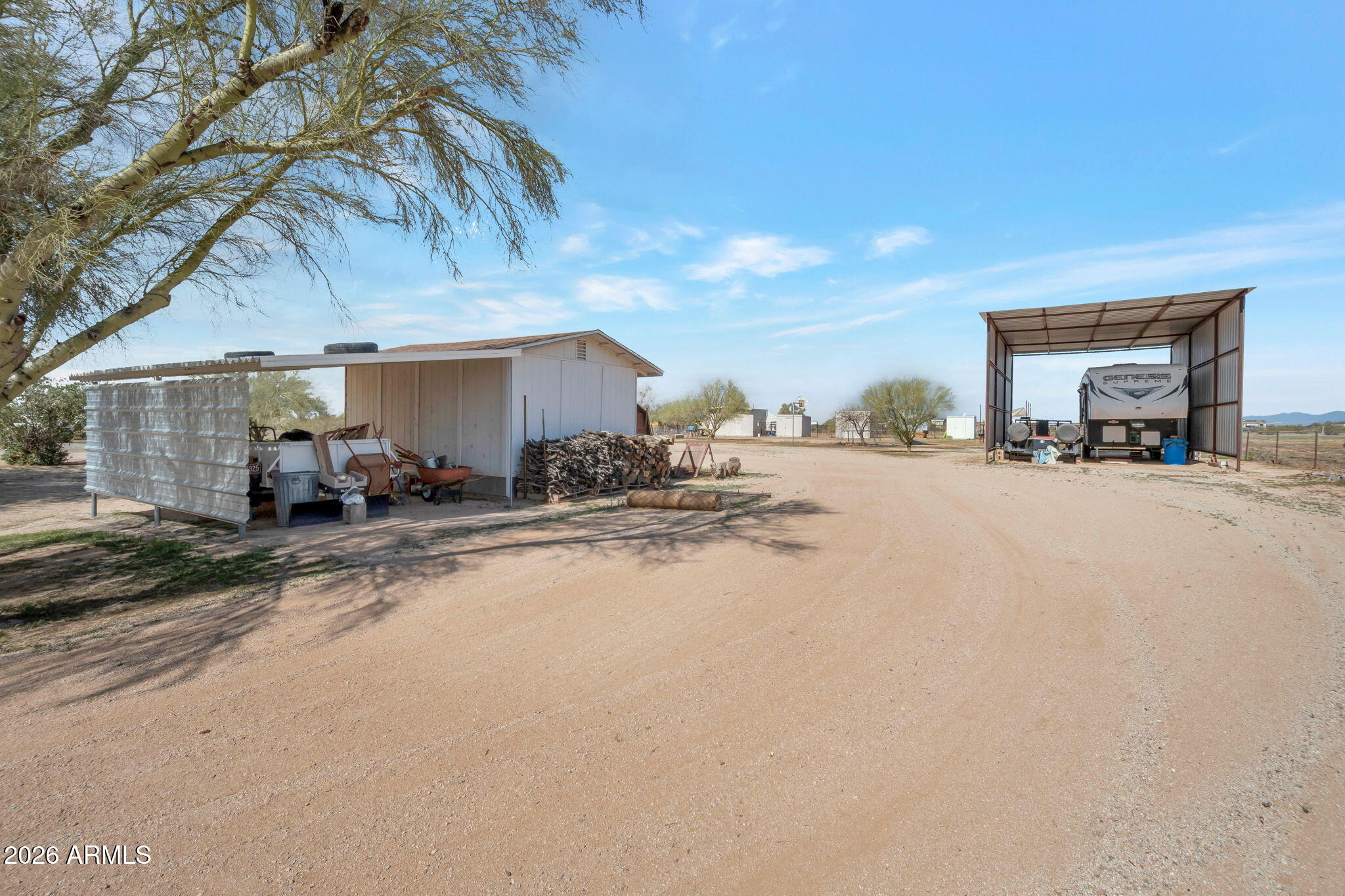 8865 North Page Road Florence, AZ 85132 - Photo 12 of 15 a view of a street with a car parked in front of it