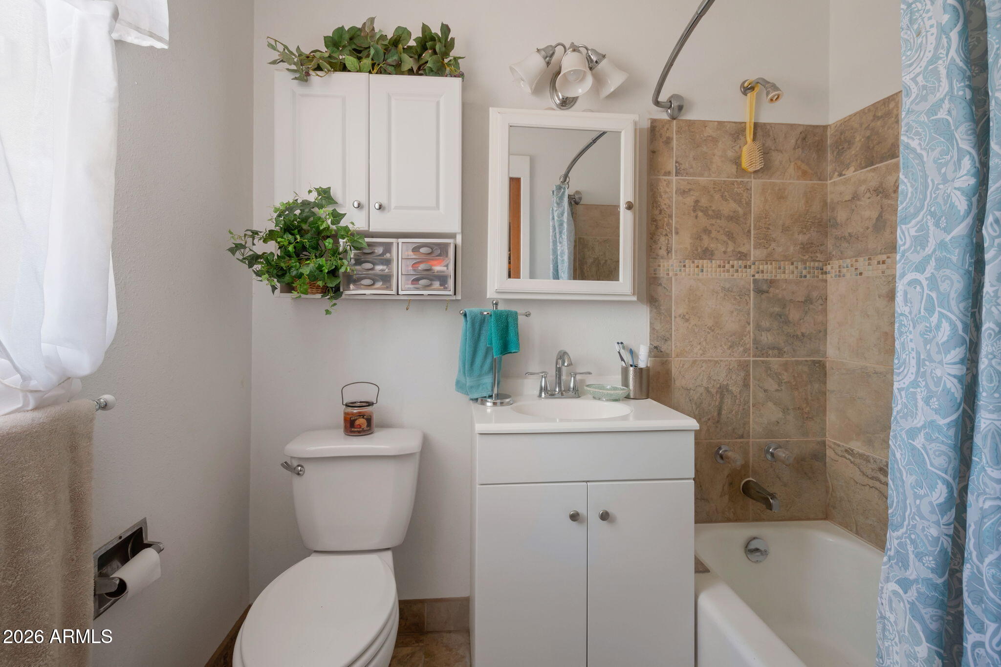 8865 North Page Road Florence, AZ 85132 - Photo 8 of 15 a bathroom with a sink toilet and shower