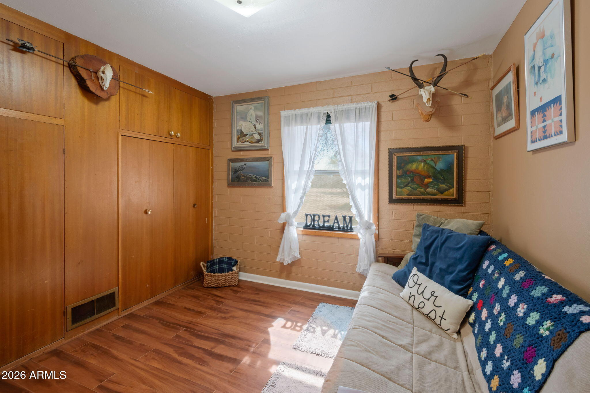 8865 North Page Road Florence, AZ 85132 - Photo 10 of 15 a bedroom with a bed and a window