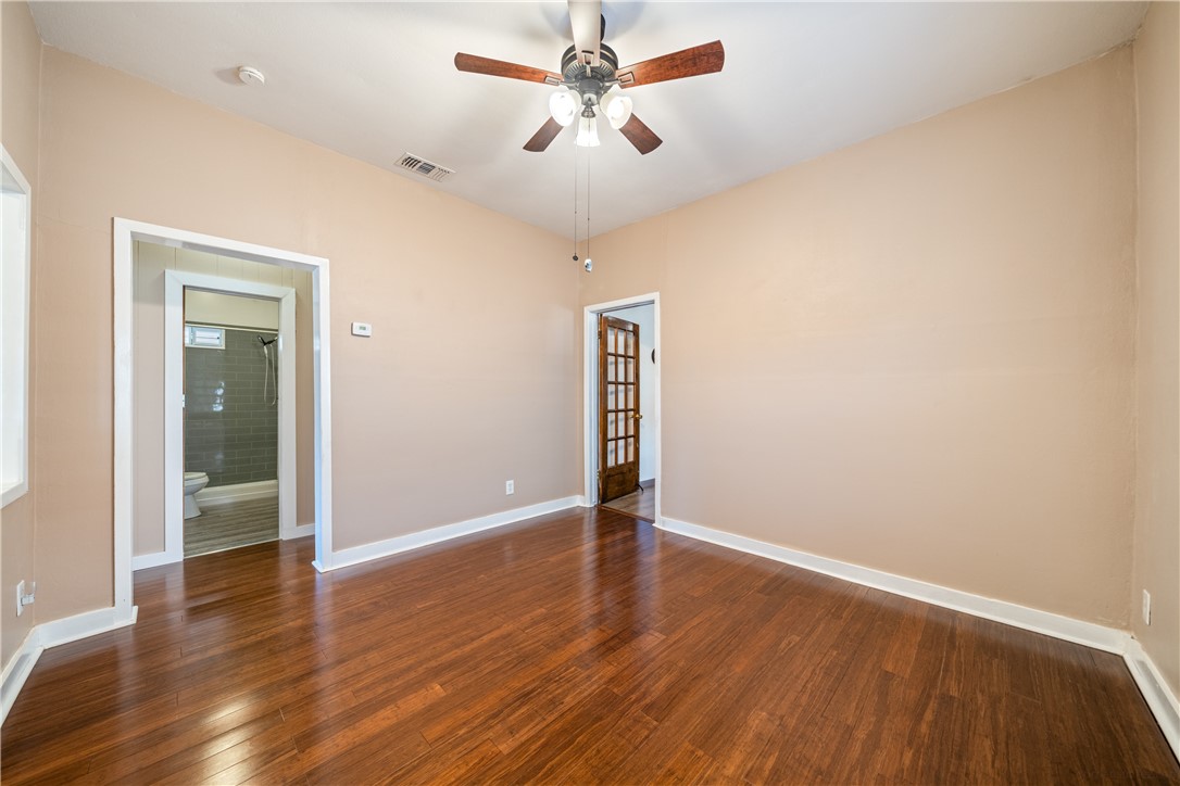 1205 10th Street Corpus Christi, TX 78404 - Photo 13 of 38 wooden floor in an empty room