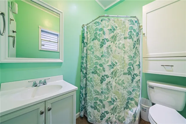 a bathroom with a sink and a toilet