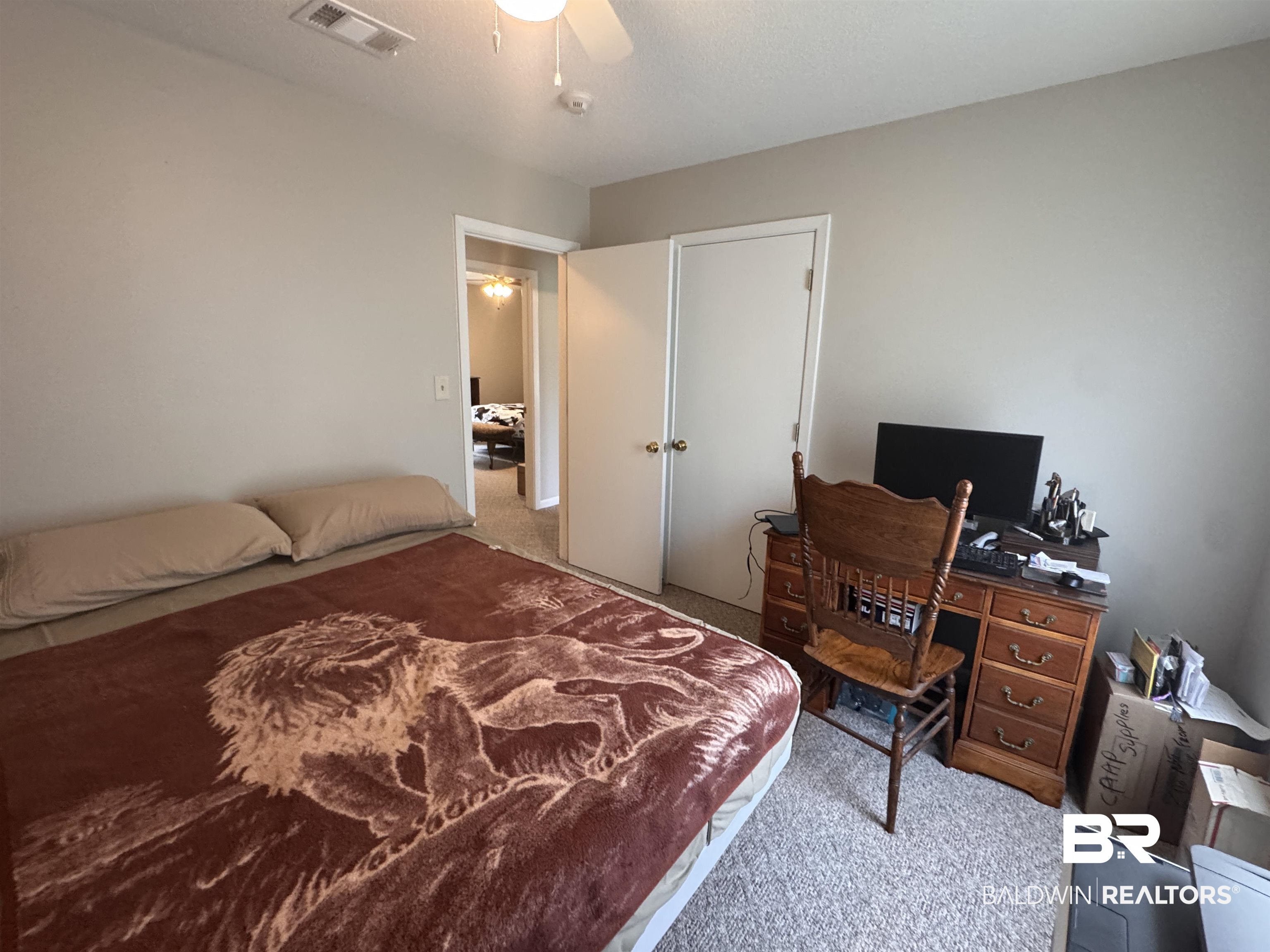15148 Highland Circle Foley, AL 36535 - Photo 21 of 47 Carpeted bedroom with ceiling fan