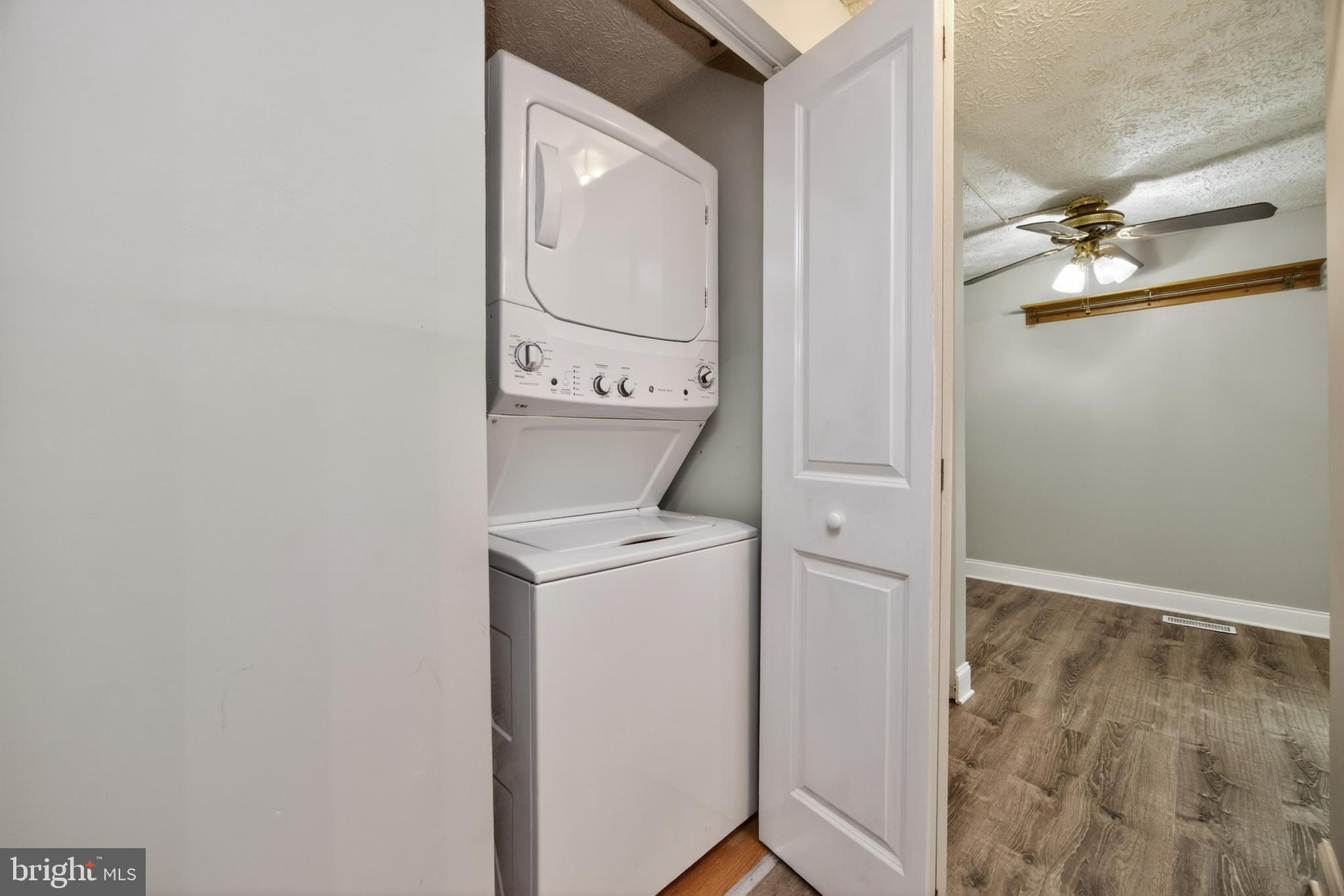 348 Barclay Street Coatesville, PA 19320 - Photo 13 of 28 a room that has a dryer and washer