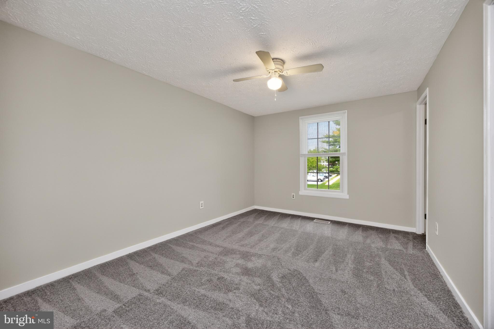 348 Barclay Street Coatesville, PA 19320 - Photo 16 of 28 a view of an empty room with a window