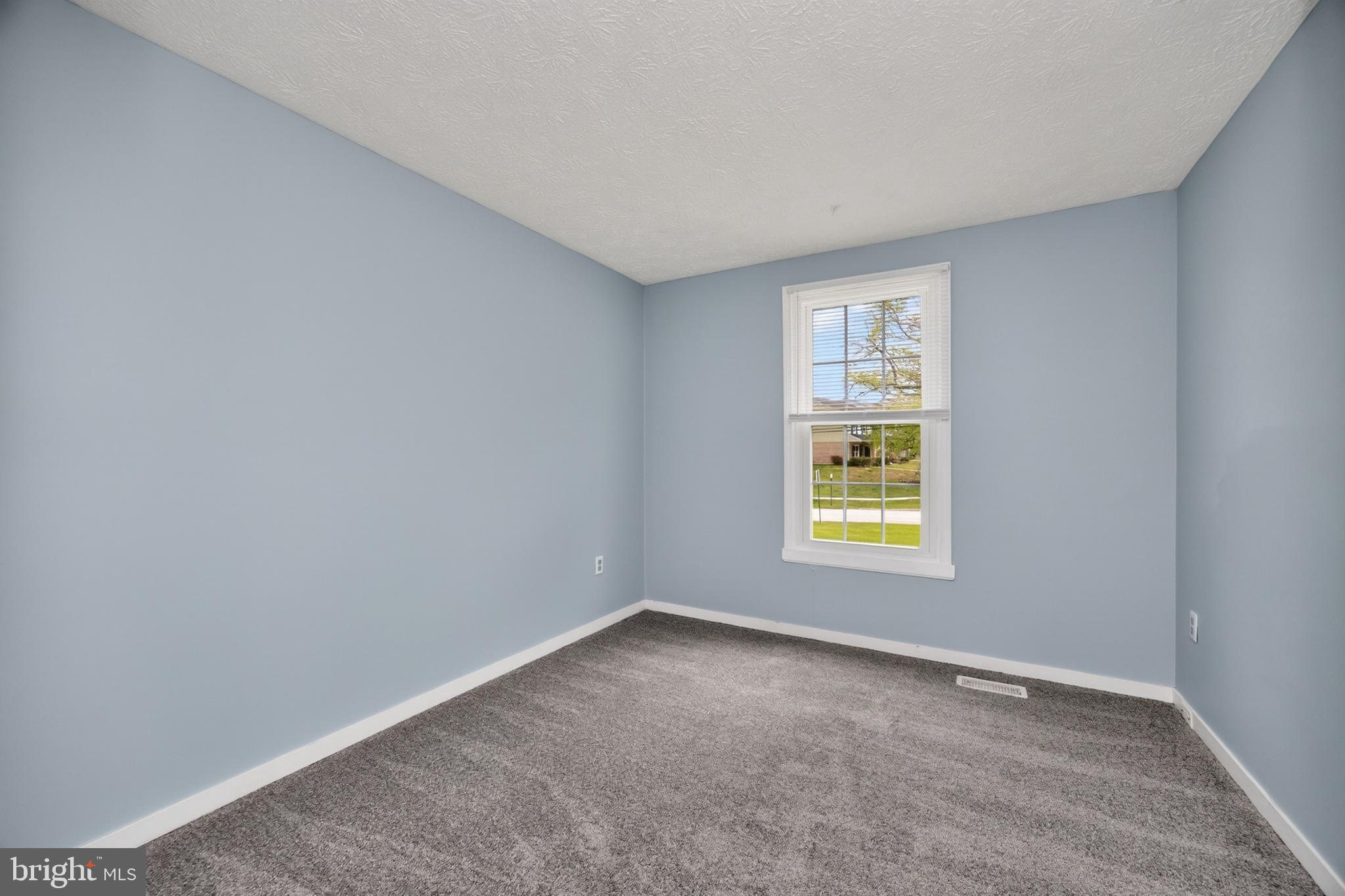 348 Barclay Street Coatesville, PA 19320 - Photo 18 of 28 an empty room with a window