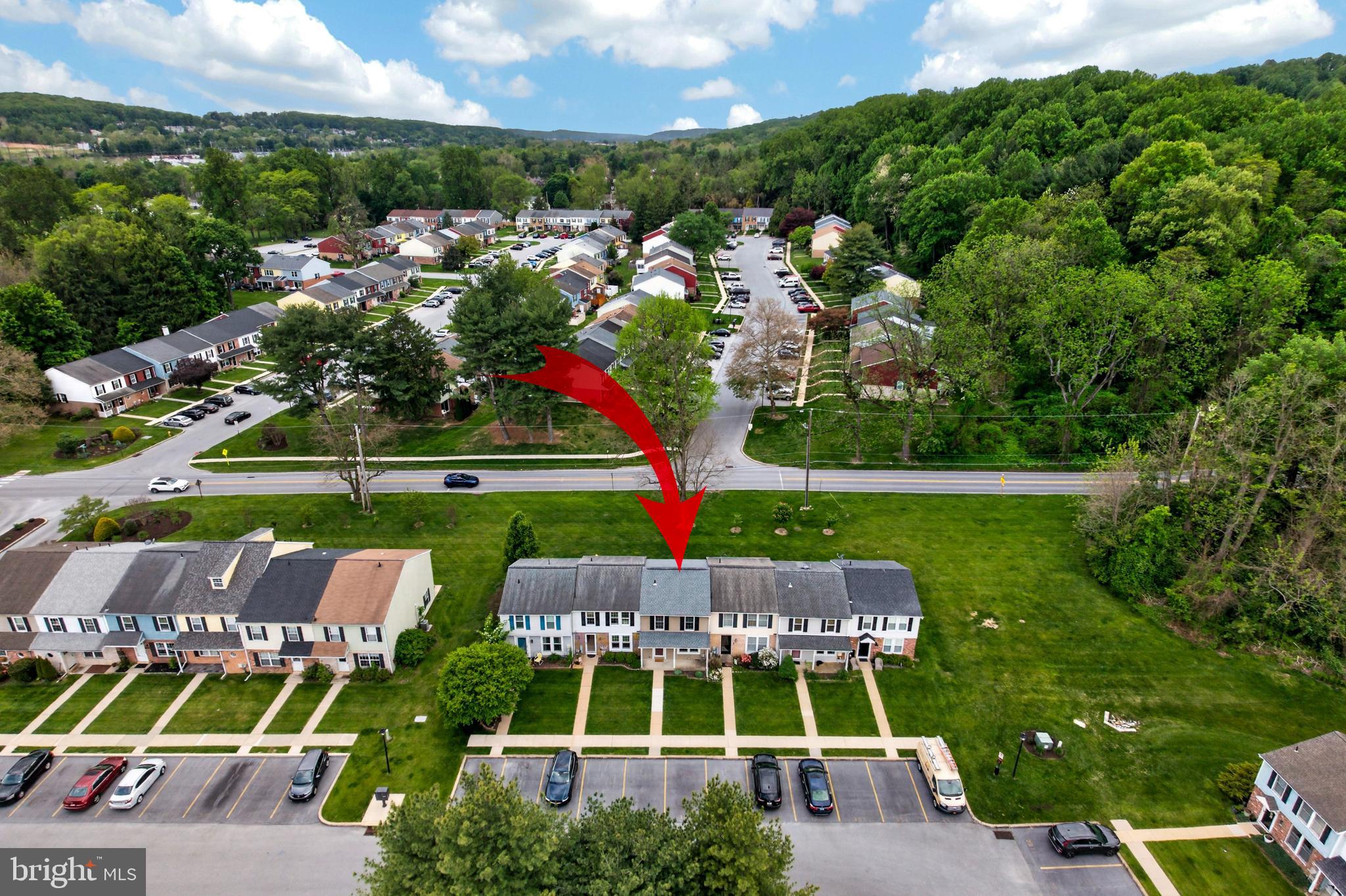 348 Barclay Street Coatesville, PA 19320 - Photo 25 of 28 an aerial view of a house with a garden and lake view