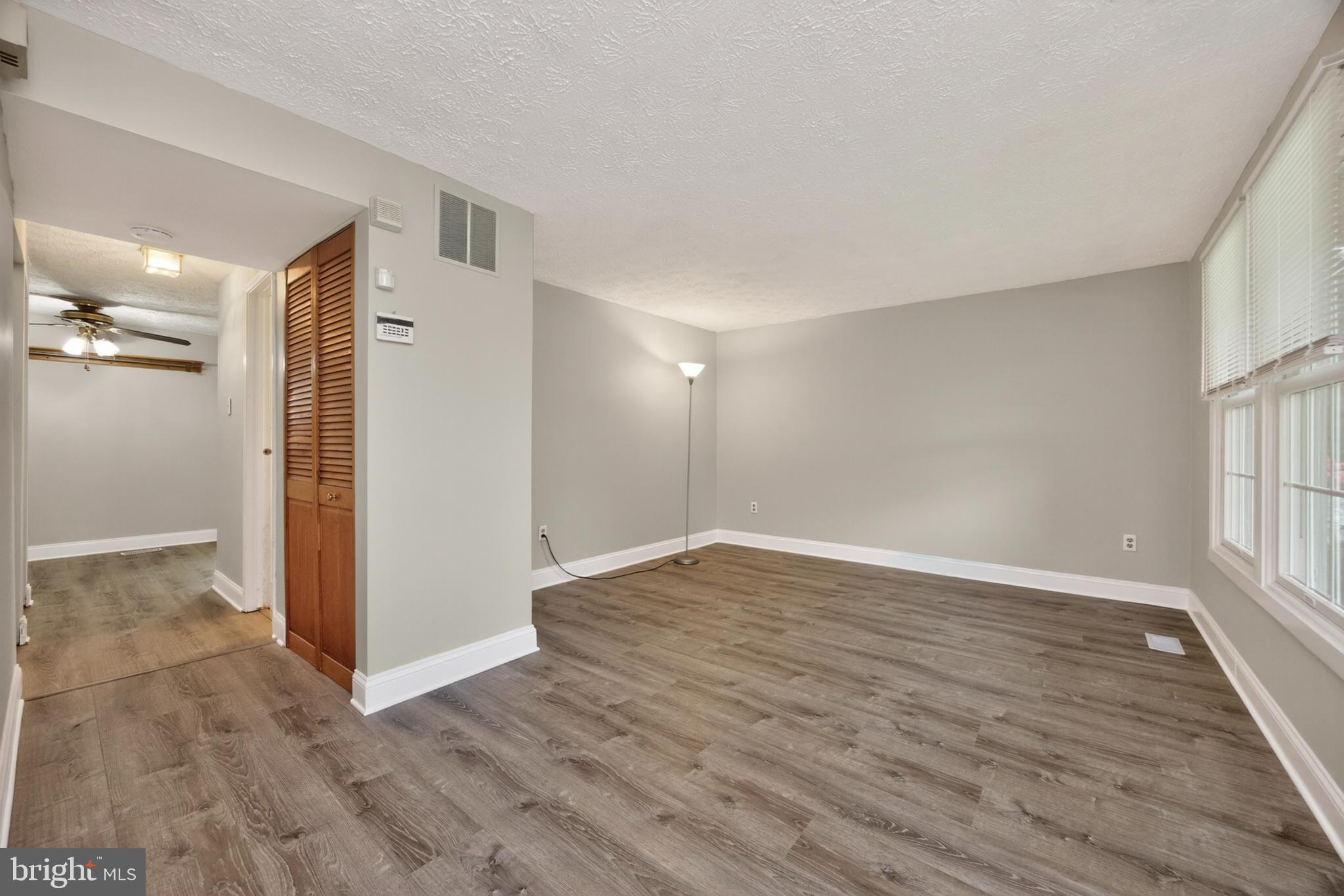 348 Barclay Street Coatesville, PA 19320 - Photo 7 of 28 a view of empty room with wooden floor