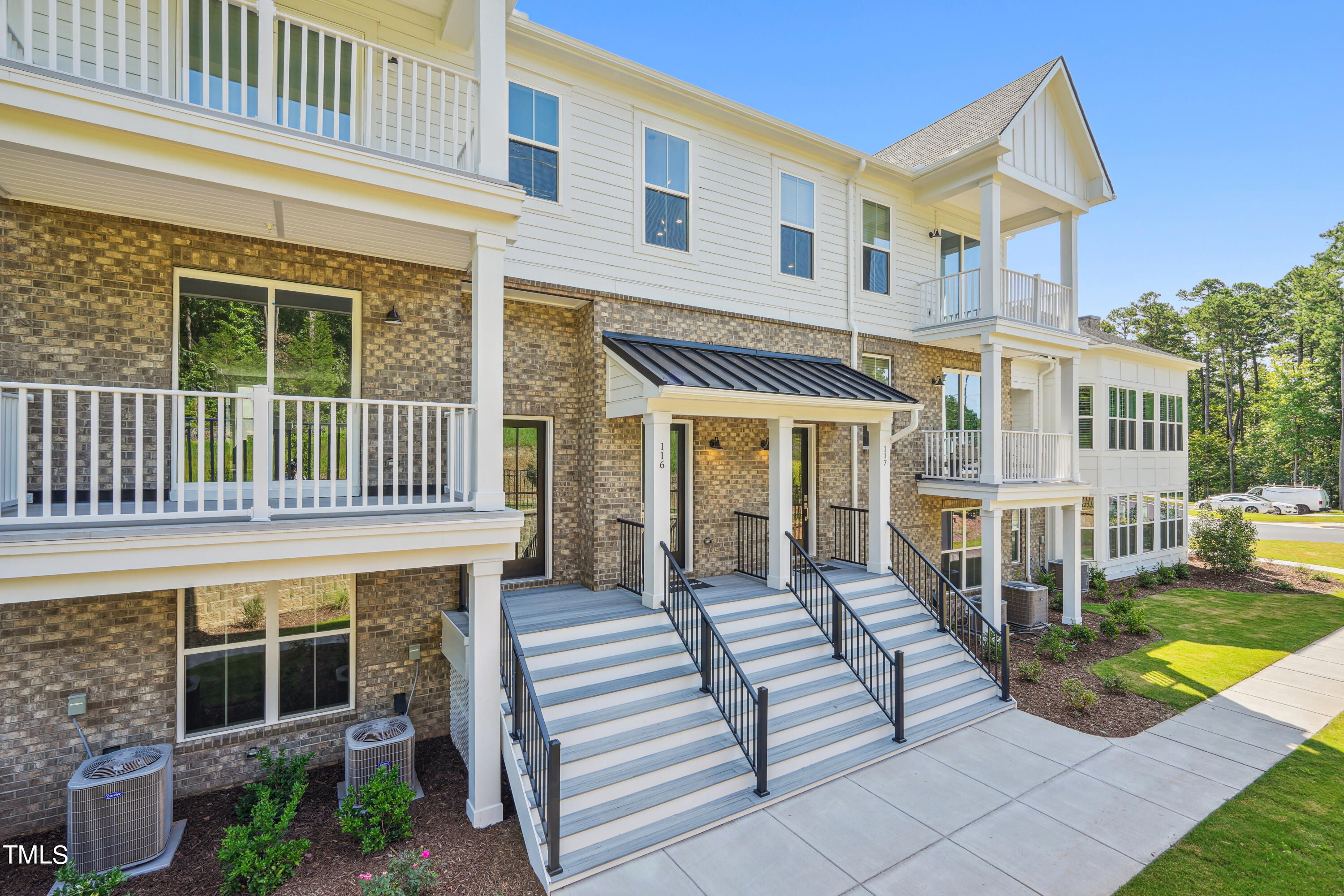 11549 Helmond Way, Unit 117 Raleigh, NC 27617 - Photo 1 of 34 a view of a house with a porch