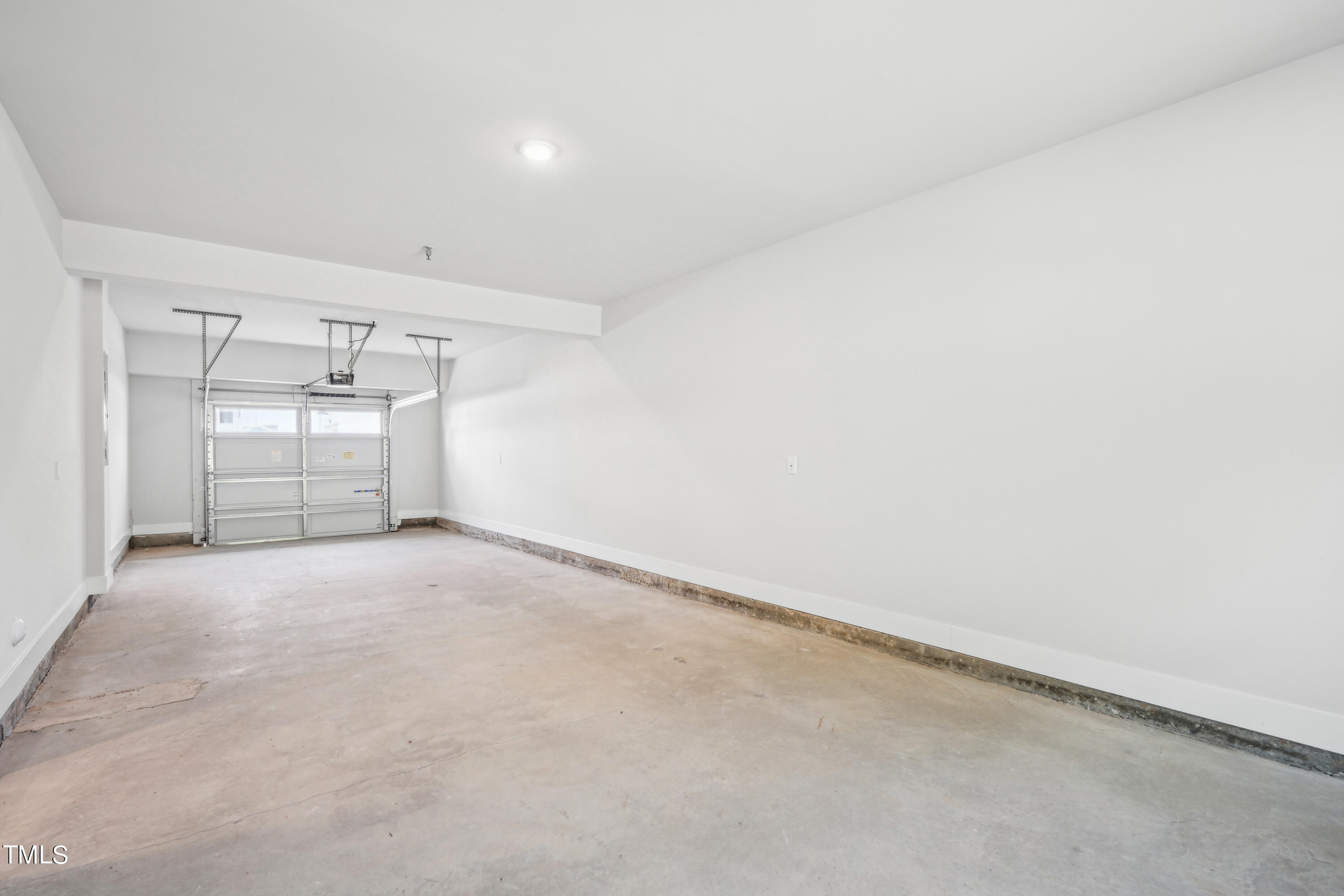 11549 Helmond Way, Unit 117 Raleigh, NC 27617 - Photo 17 of 34 a view of an empty room