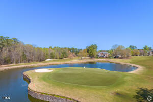 11549 Helmond Way, Unit 117 Raleigh, NC 27617 - Photo 21 of 34 a view of an outdoor space and swimming pool