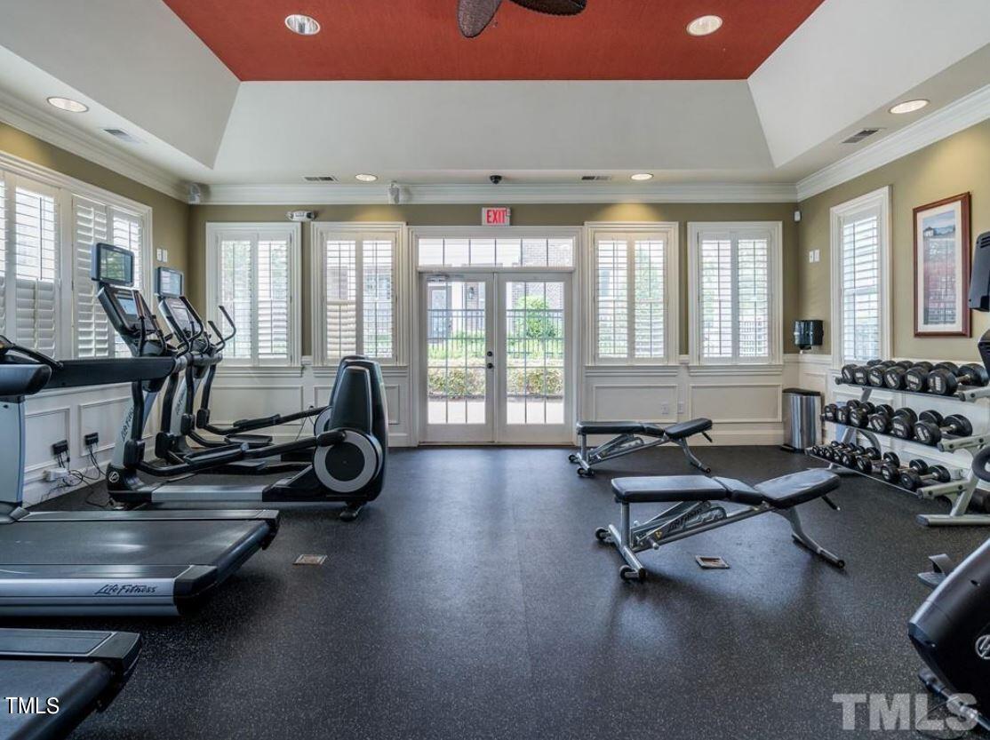 11549 Helmond Way, Unit 117 Raleigh, NC 27617 - Photo 23 of 34 a view of a room with gym equipment