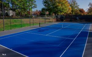 11549 Helmond Way, Unit 117 Raleigh, NC 27617 - Photo 28 of 34 a view of a tennis court