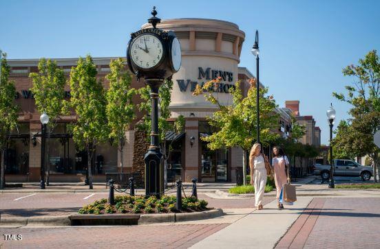 11549 Helmond Way, Unit 117 Raleigh, NC 27617 - Photo 29 of 34 a front view of a building with street view