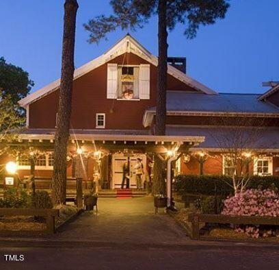 11549 Helmond Way, Unit 117 Raleigh, NC 27617 - Photo 33 of 34 a front view of a building with street view