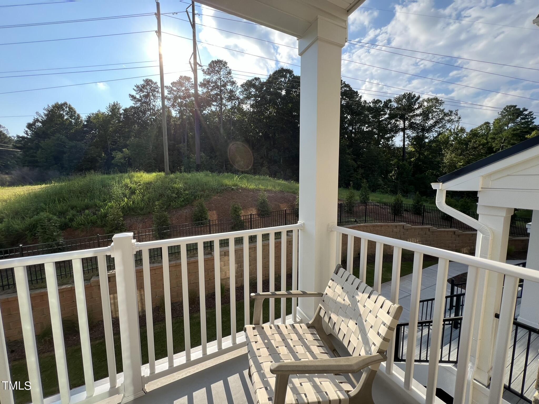 11549 Helmond Way, Unit 117 Raleigh, NC 27617 - Photo 7 of 34 a view of a chair in the roof deck