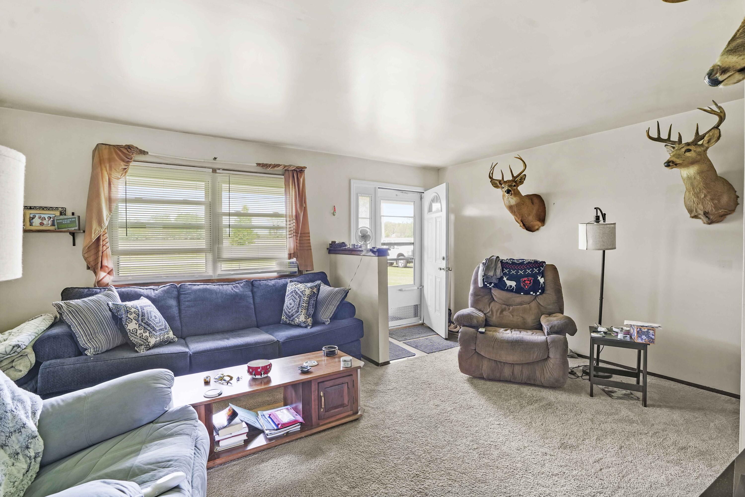 9461 Stateline Road Dyer, IN 46311 - Photo 8 of 19 a living room with furniture and a window