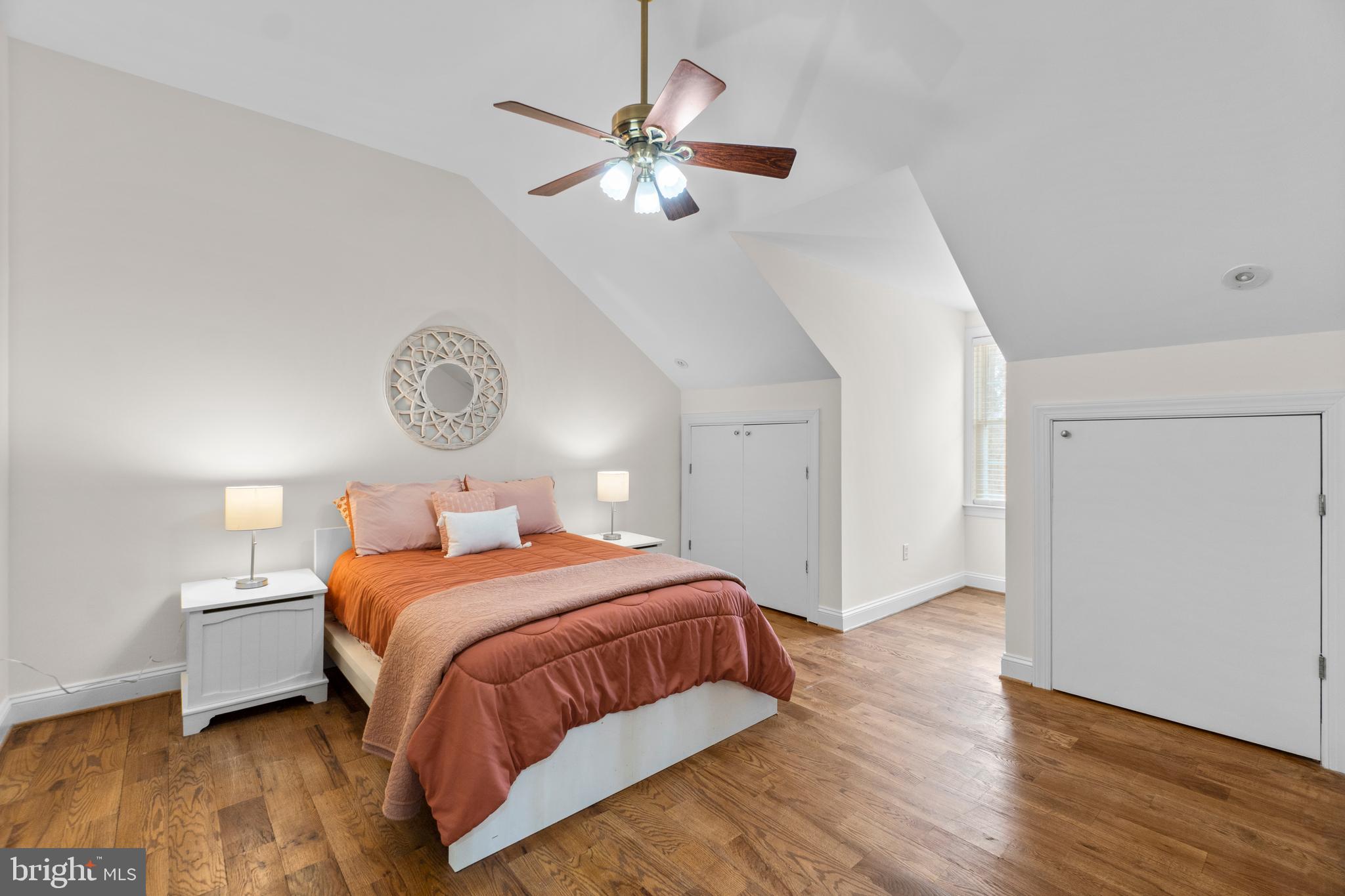 21877 Boonsboro Mountain Road Boonsboro, MD 21713 - Photo 37 of 62 a bedroom with a bed and a chandelier
