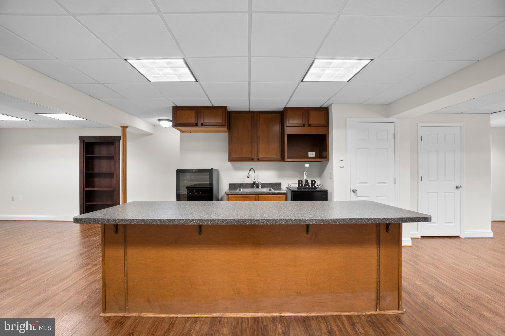 21877 Boonsboro Mountain Road Boonsboro, MD 21713 - Photo 45 of 62 a large kitchen with stainless steel appliances granite countertop a stove a sink and a microwave