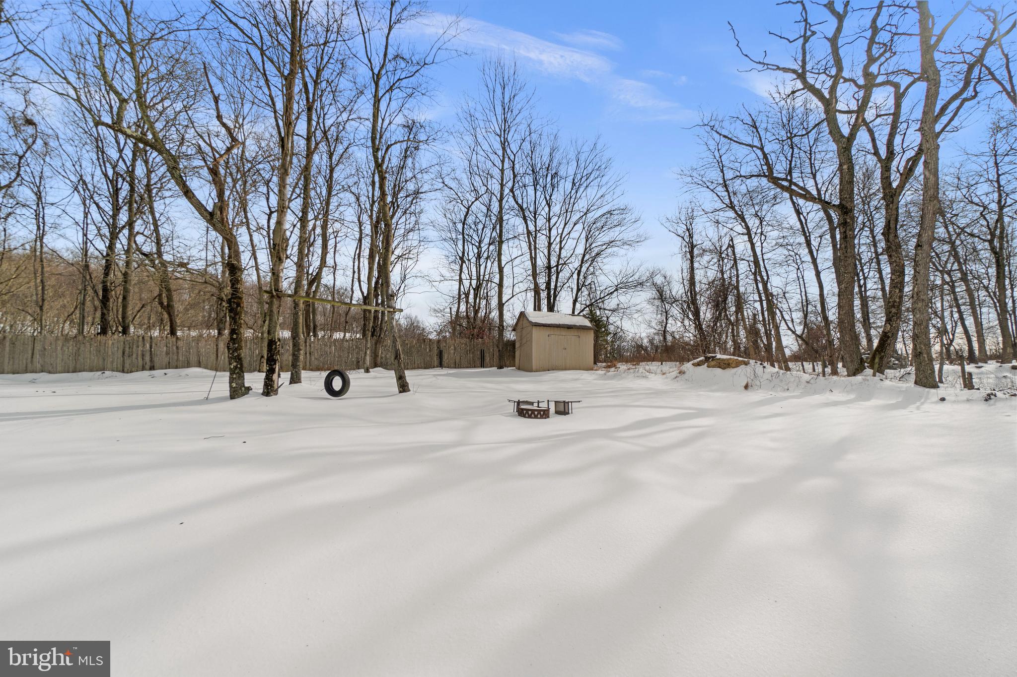 21877 Boonsboro Mountain Road Boonsboro, MD 21713 - Photo 57 of 62 a view of road with snow on the roadside