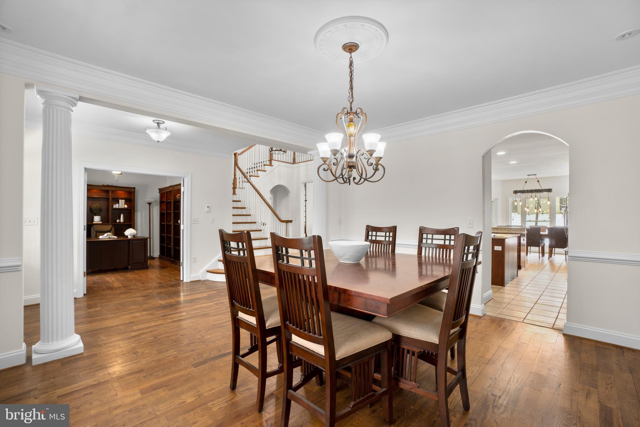 21877 Boonsboro Mountain Road Boonsboro, MD 21713 - Photo 10 of 62 a view of a dining room with furniture wooden floor and chandelier