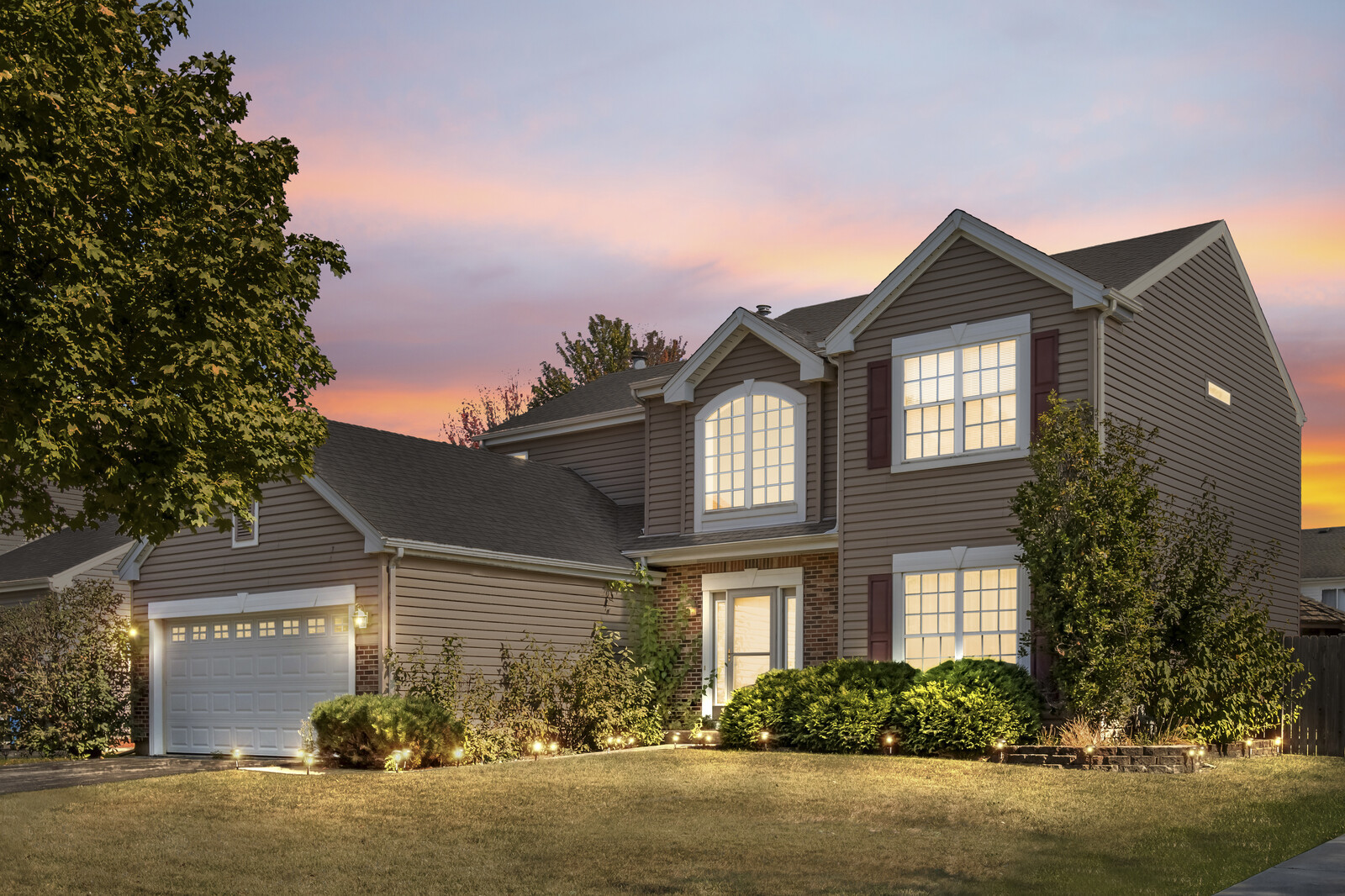 207 Faircroft Road Bartlett, IL 60103 - Photo 1 of 29 a front view of a house with a yard and garage