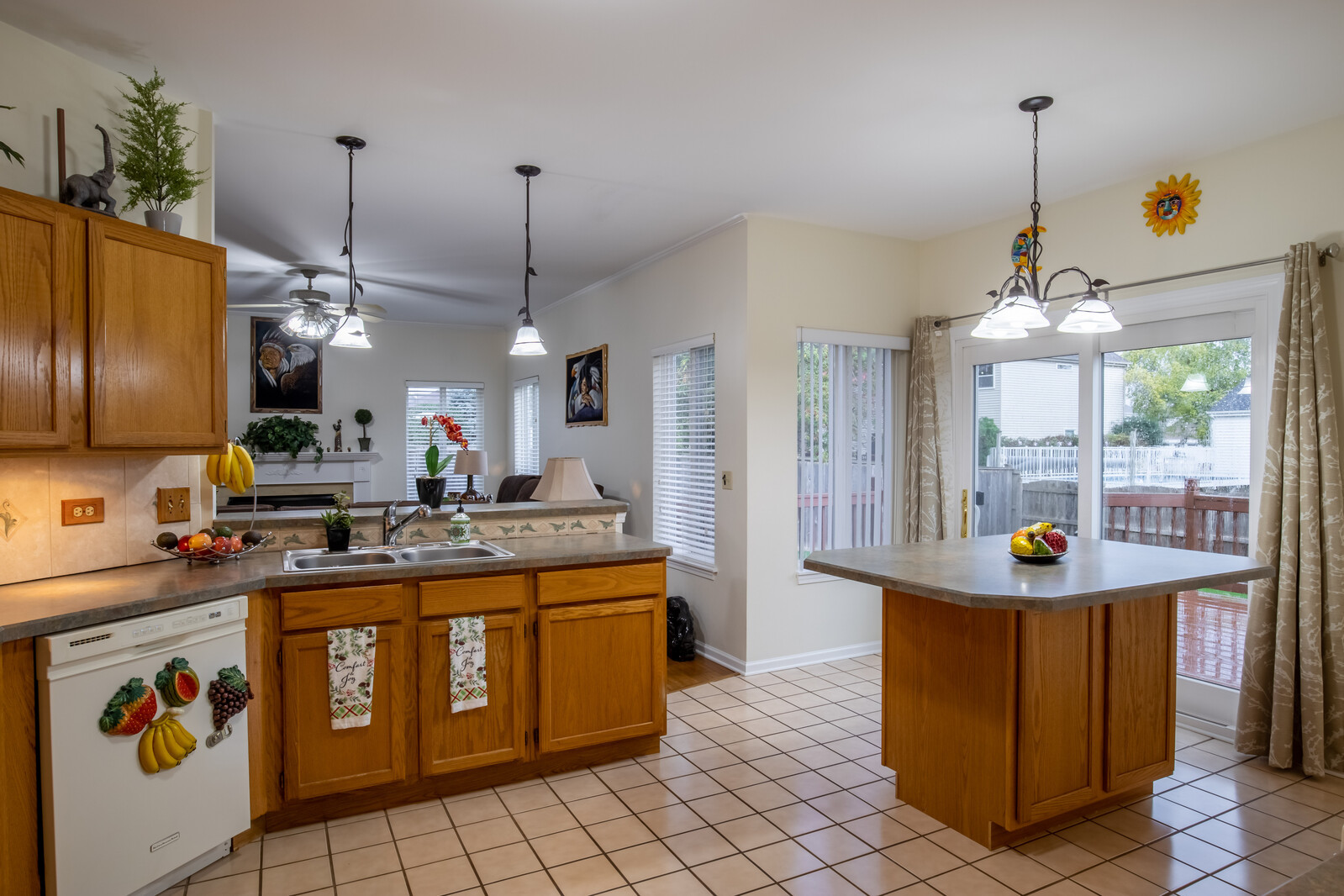 207 Faircroft Road Bartlett, IL 60103 - Photo 18 of 29 a kitchen with a sink stove and cabinets