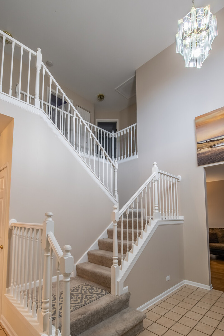 207 Faircroft Road Bartlett, IL 60103 - Photo 3 of 29 a view of entryway with wooden floor