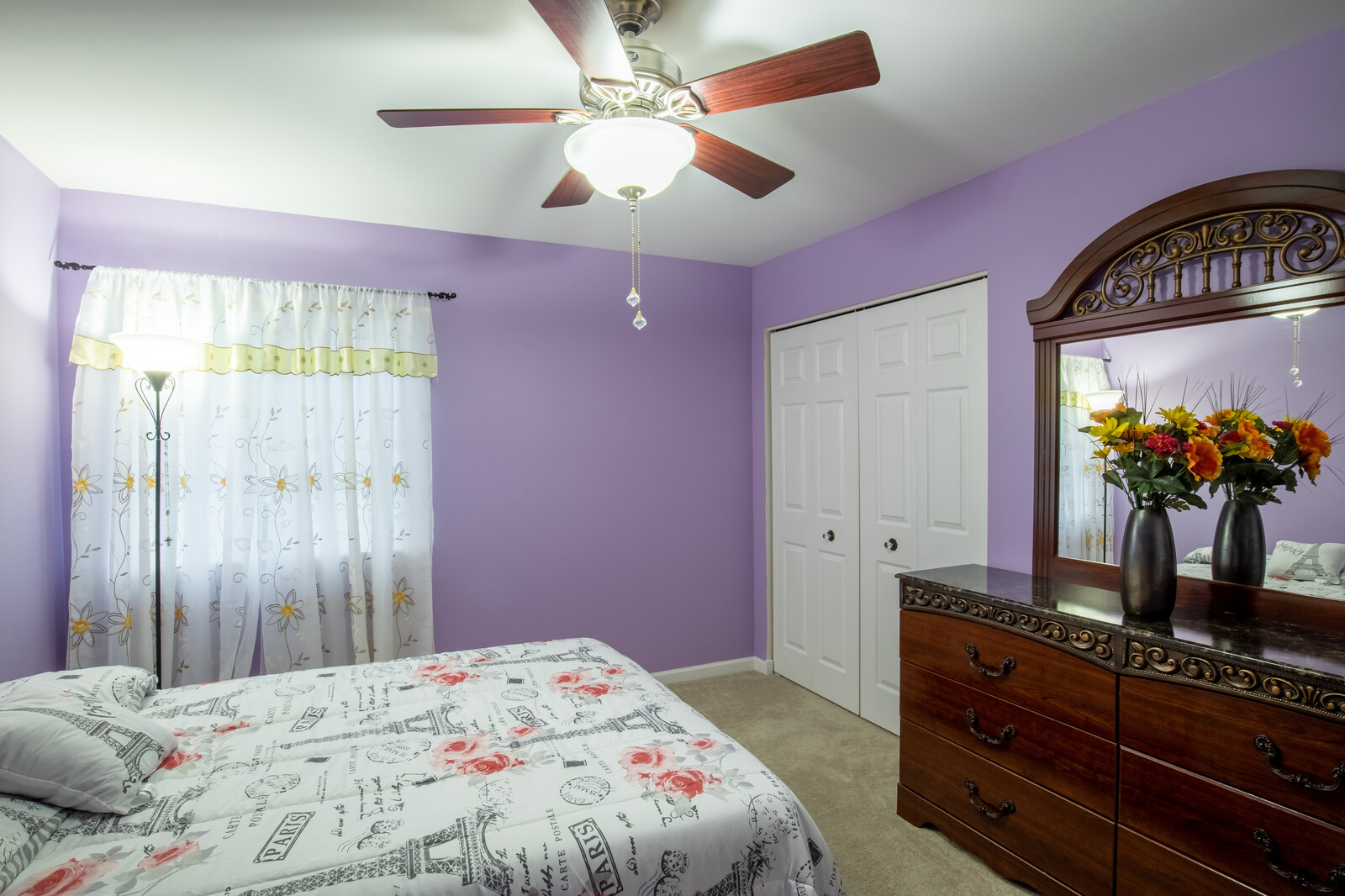 207 Faircroft Road Bartlett, IL 60103 - Photo 7 of 29 a bedroom with a bed and a dresser