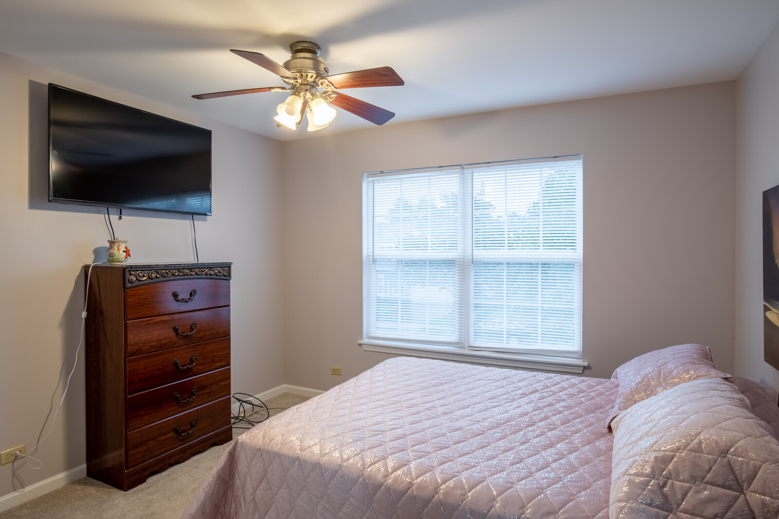 207 Faircroft Road Bartlett, IL 60103 - Photo 9 of 29 a bedroom with a bed and a flat screen tv