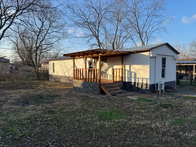 a view of an house with backyard space